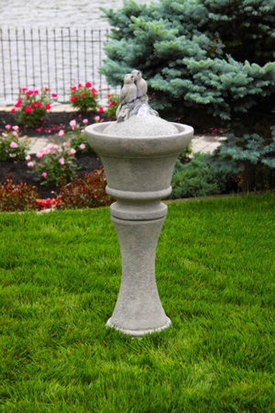 Fountain with love birds singing garden decor